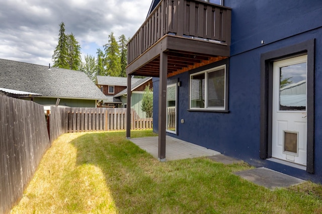 443 Karrow Ave, Whitefish, MT 59937 - fenced backyard featuring a patio area and a wooden deck