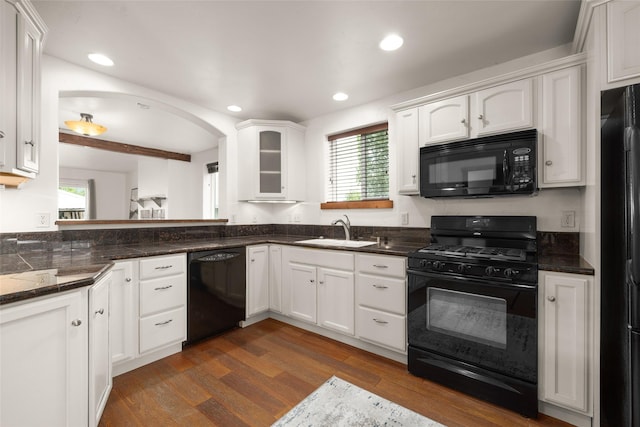 443 Karrow Ave, Whitefish, MT 59937 - kitchen featuring black appliances, healthy amount of natural light, dark wood-style floors, white cabinets, and recessed lighting