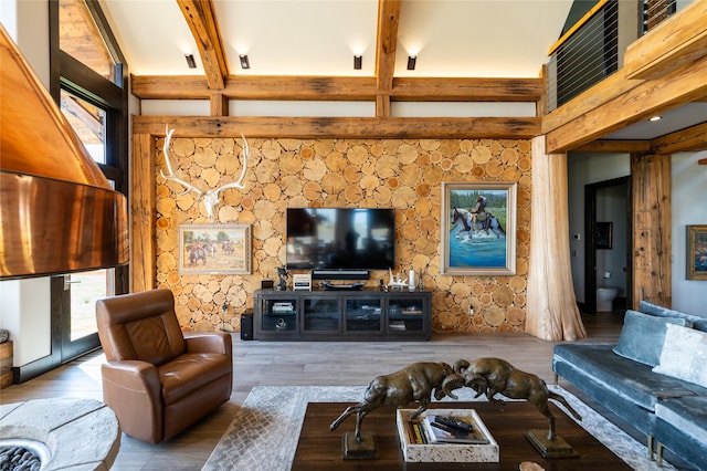 155 Peacemaker Rdg, Belt, MT 59412 - living area featuring plenty of natural light, beam ceiling, and wood finished floors