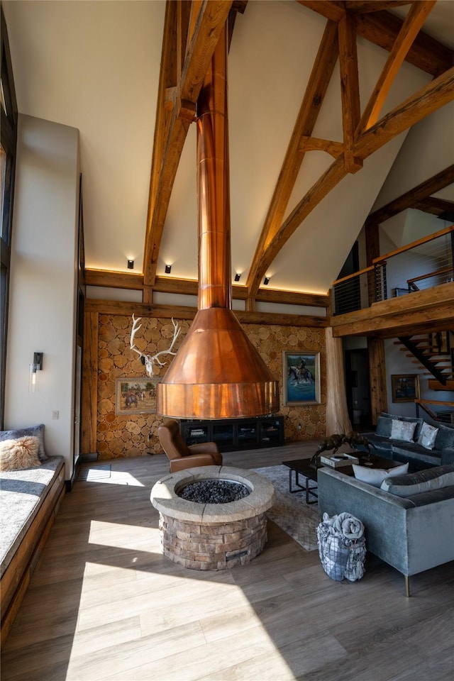 155 Peacemaker Rdg, Belt, MT 59412 - sitting room with high vaulted ceiling, wood finished floors, beam ceiling, and stairs