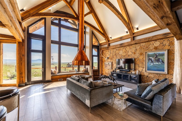 155 Peacemaker Rdg, Belt, MT 59412 - living room with beam ceiling, high vaulted ceiling, and dark wood-type flooring