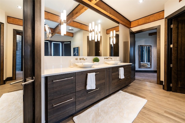155 Peacemaker Rdg, Belt, MT 59412 - full bath with wood finished floors, double vanity, and beam ceiling