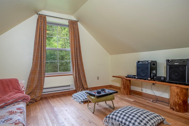 983 Lake Dr, Columbia Falls, MT 59912 - office with baseboard heating, wood finished floors, and vaulted ceiling