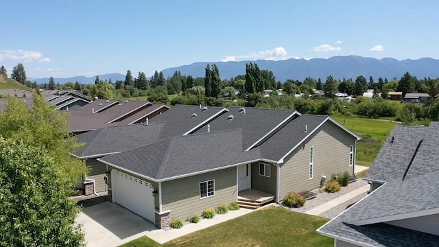 209 E Nicklaus Ave, Kalispell, MT 59901 - aerial view of property and surrounding area featuring mountains
