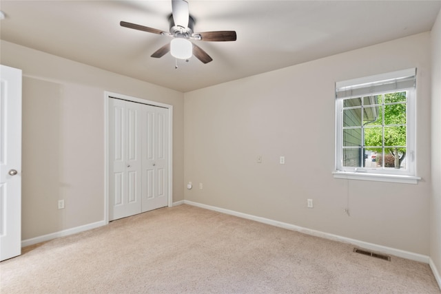209 E Nicklaus Ave, Kalispell, MT 59901 - unfurnished bedroom featuring carpet flooring, a closet, and ceiling fan