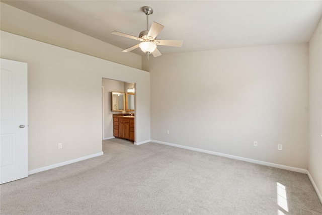 209 E Nicklaus Ave, Kalispell, MT 59901 - unfurnished bedroom featuring light colored carpet, ensuite bath, a ceiling fan, and lofted ceiling