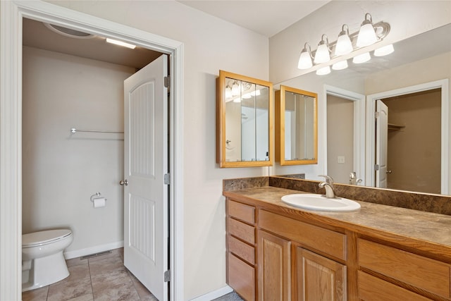 209 E Nicklaus Ave, Kalispell, MT 59901 - bathroom featuring vanity and tile patterned flooring