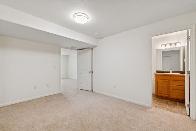 209 E Nicklaus Ave, Kalispell, MT 59901 - unfurnished bedroom featuring carpet floors and ensuite bath