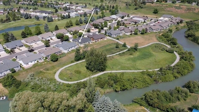 209 E Nicklaus Ave, Kalispell, MT 59901 - aerial view of property's location featuring a large body of water and nearby suburban area