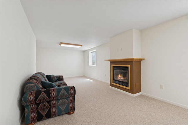 209 E Nicklaus Ave, Kalispell, MT 59901 - living area featuring a glass covered fireplace and carpet floors