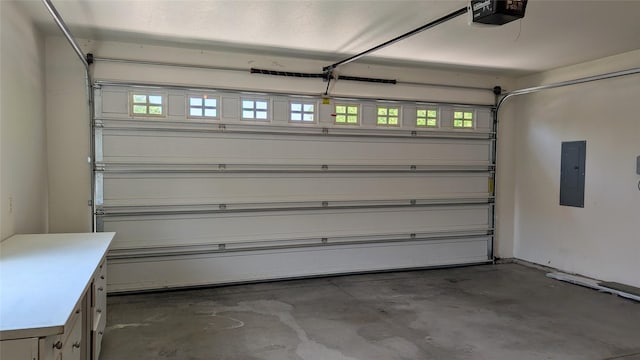 209 E Nicklaus Ave, Kalispell, MT 59901 - garage with a garage door opener and electric panel