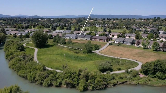 209 E Nicklaus Ave, Kalispell, MT 59901 - aerial perspective of suburban area with a mountain backdrop