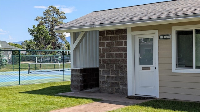 209 E Nicklaus Ave, Kalispell, MT 59901 - doorway to property with roof with shingles