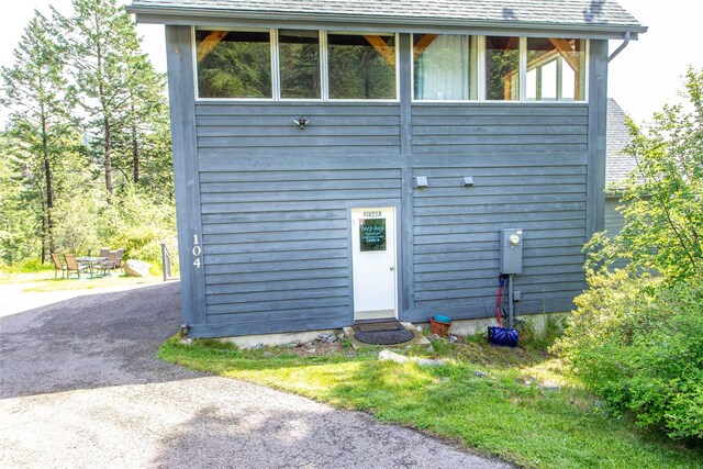 100 Deep Bay Dr, Lakeside, MT 59922 - rear view of property with asphalt driveway