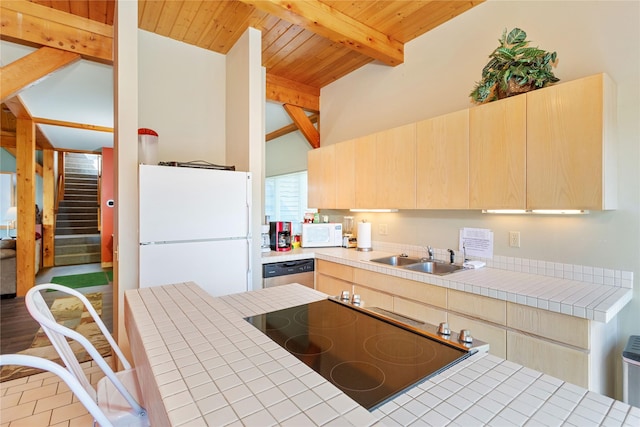 100 Deep Bay Dr, Lakeside, MT 59922 - kitchen featuring white appliances, light brown cabinetry, wooden ceiling, and tile countertops