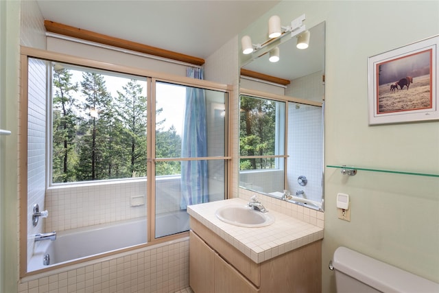 100 Deep Bay Dr, Lakeside, MT 59922 - full bathroom featuring tiled bath and vanity
