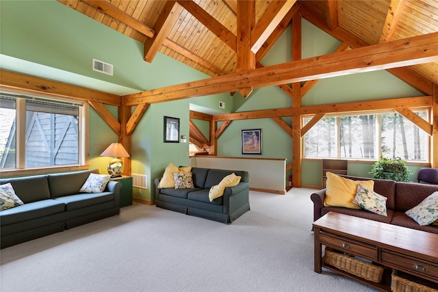 100 Deep Bay Dr, Lakeside, MT 59922 - carpeted living room with healthy amount of natural light, a wood ceiling with exposed beams, and high vaulted ceiling