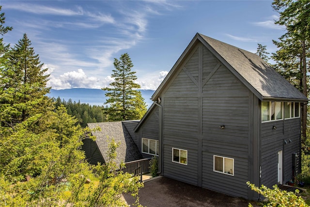 100 Deep Bay Dr, Lakeside, MT 59922 - view of home's exterior with a shingled roof