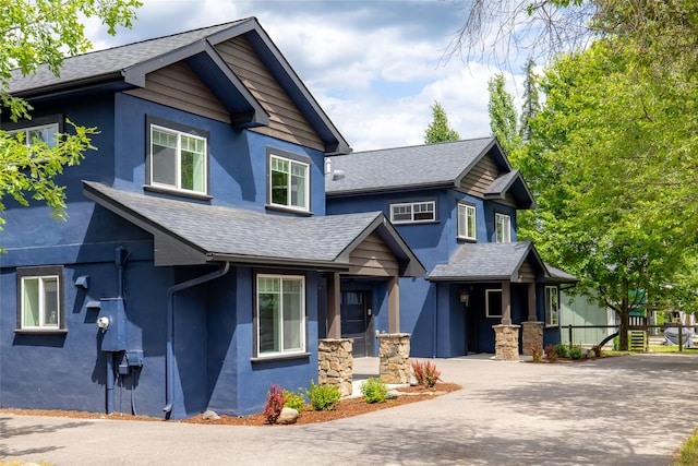 441/443 Karrow Ave, Whitefish, MT 59937 - craftsman-style house with stucco siding and roof with shingles