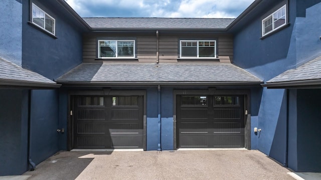 441/443 Karrow Ave, Whitefish, MT 59937 - garage with asphalt driveway and french doors