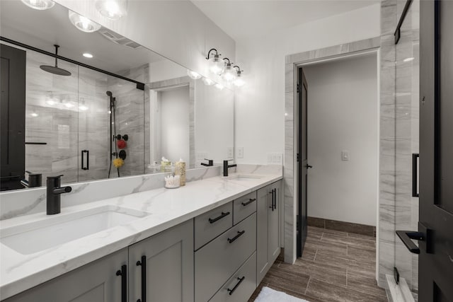 441/443 Karrow Ave, Whitefish, MT 59937 - bathroom featuring double vanity and a stall shower