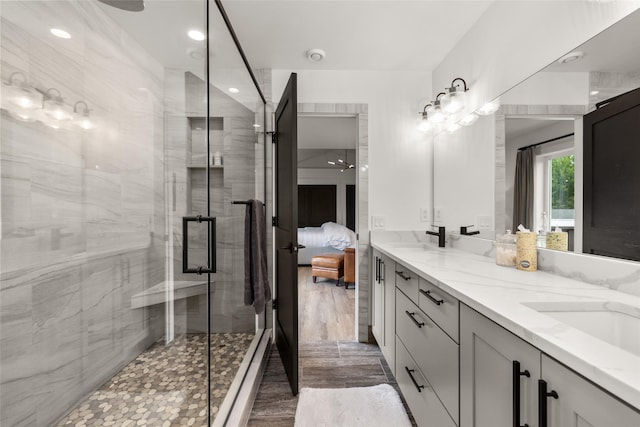 441/443 Karrow Ave, Whitefish, MT 59937 - ensuite bathroom with double vanity, a stall shower, and recessed lighting