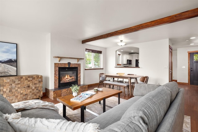 441/443 Karrow Ave, Whitefish, MT 59937 - living room featuring wood finished floors, a tile fireplace, beamed ceiling, and recessed lighting