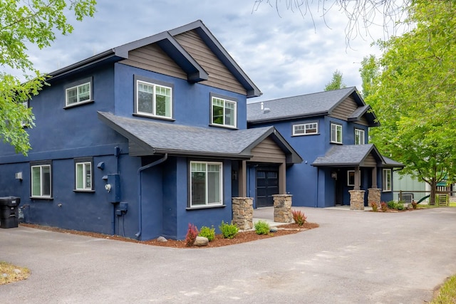 441/443 Karrow Ave, Whitefish, MT 59937 - craftsman inspired home with stucco siding and roof with shingles