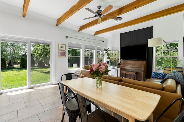 5014 Eastside Hwy, Stevensville, MT 59870 - dining area featuring beam ceiling, light tile patterned floors, and a ceiling fan