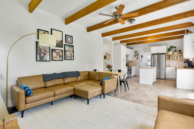 5014 Eastside Hwy, Stevensville, MT 59870 - living room featuring a ceiling fan and beam ceiling