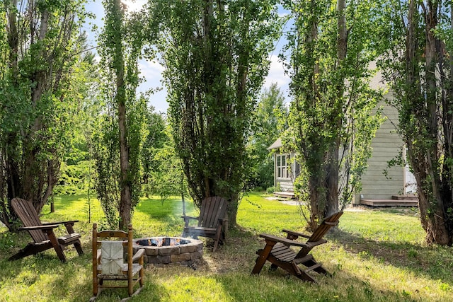 5014 Eastside Hwy, Stevensville, MT 59870 - view of green lawn featuring a fire pit