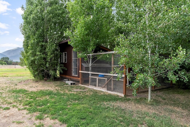 5014 Eastside Hwy, Stevensville, MT 59870 - view of poultry coop with a yard and a mountain view