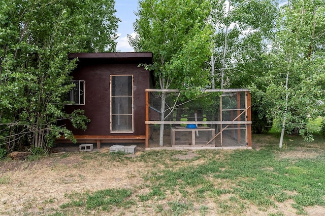 5014 Eastside Hwy, Stevensville, MT 59870 - view of poultry coop featuring a lawn
