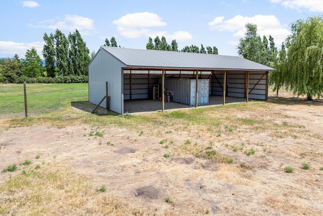 5014 Eastside Hwy, Stevensville, MT 59870 - view of pole building featuring a carport