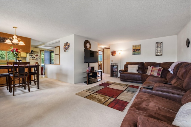 305 S Dell Dr, Havre, MT 59501 - carpeted living area with a chandelier and a textured ceiling