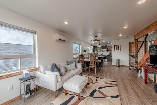 620 Phillips St Unit B, Missoula, MT 59802 - living area with an AC wall unit, light wood-style flooring, recessed lighting, stairs, and ceiling fan