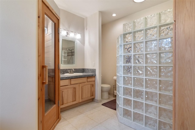 6611 Packer Creek Rd, Haugan, MT 59842 - full bathroom with vanity, tile patterned flooring, and a shower