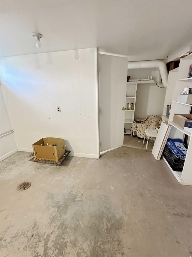 214 2nd Ave SW, Cut Bank, MT 59427 - unfurnished bedroom featuring unfinished concrete flooring