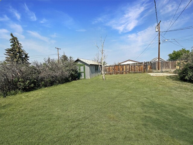 214 2nd Ave SW, Cut Bank, MT 59427 - view of yard with an outdoor structure