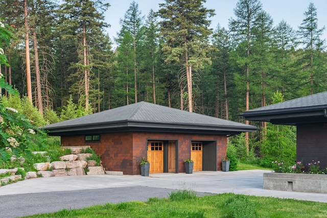 6601 Russian Joe Rd, Missoula, MT 59802 - garage with a wooded view