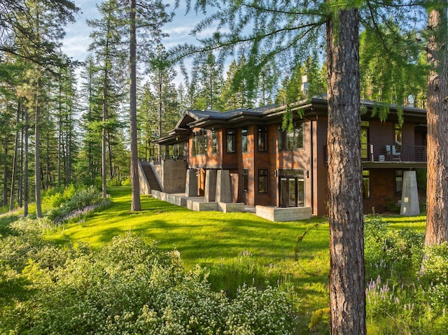 6601 Russian Joe Rd, Missoula, MT 59802 - back of house with stairs and a lawn