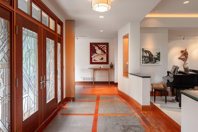 6601 Russian Joe Rd, Missoula, MT 59802 - foyer entrance with inlaid floor details, recessed lighting, french doors, and rail lighting