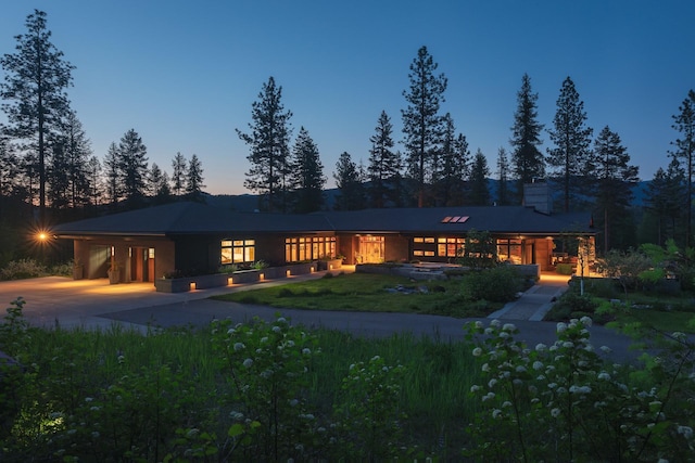 6601 Russian Joe Rd, Missoula, MT 59802 - view of front of property featuring driveway and a chimney