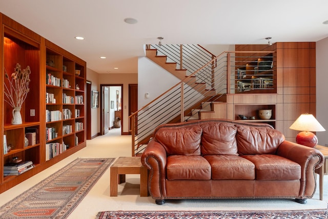 6601 Russian Joe Rd, Missoula, MT 59802 - carpeted living room with stairway and recessed lighting
