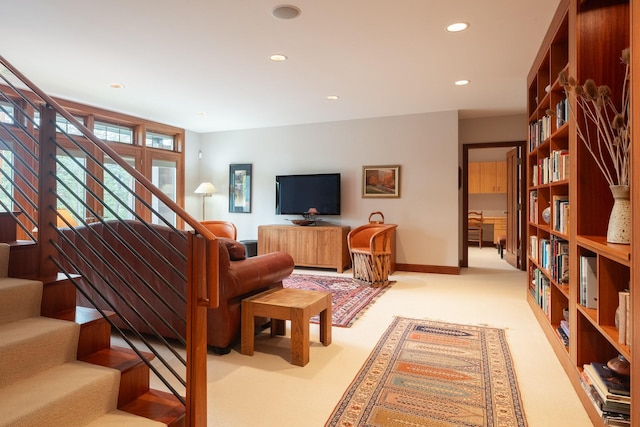 6601 Russian Joe Rd, Missoula, MT 59802 - carpeted living room featuring recessed lighting and stairs