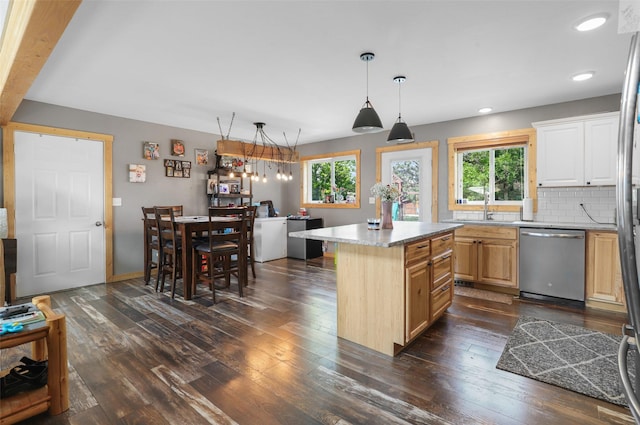 704 43rd St N, Great Falls, MT 59405 - kitchen with dishwasher, healthy amount of natural light, dark wood-type flooring, a center island, and recessed lighting