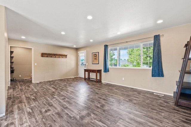 2150 Teal Dr, Kalispell, MT 59901 - unfurnished living room featuring wood finished floors and recessed lighting