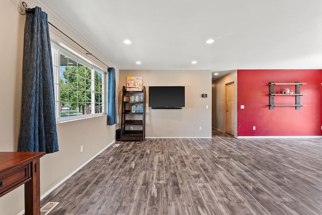 2150 Teal Dr, Kalispell, MT 59901 - unfurnished living room with wood finished floors and recessed lighting