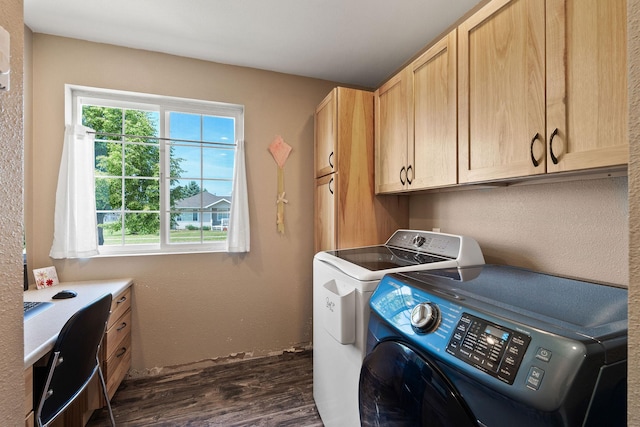 2150 Teal Dr, Kalispell, MT 59901 - laundry area with washer and dryer, plenty of natural light, dark wood-style floors, and cabinet space