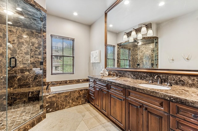 153 Slopeside Dr Unit 14, Whitefish, MT 59937 - full bath featuring a garden tub, double vanity, tile patterned floors, a shower stall, and recessed lighting